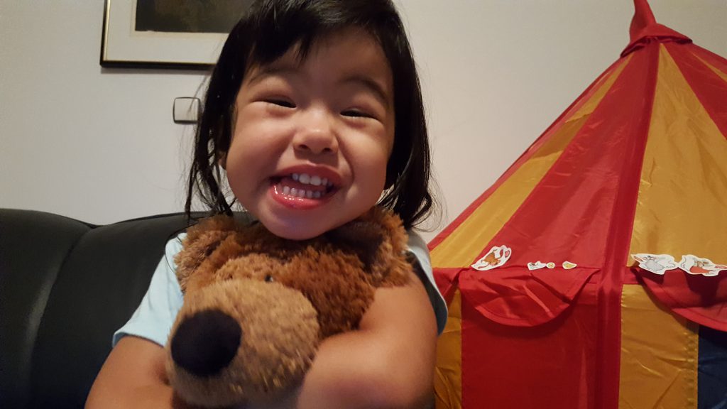 little girl with teddy bear